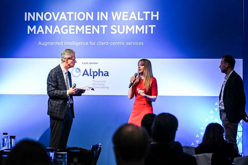 Writer and futurist Amelia Kallman onstage at Glaziers Hall in London at the PWM summit