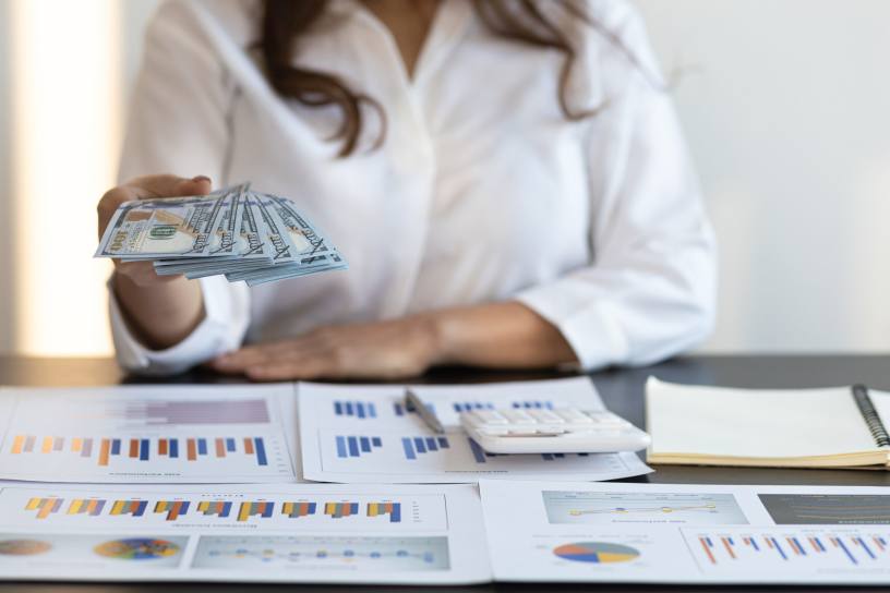 Men and women approach the preservation and distribution of wealth in contrasting ways. Image via Envato